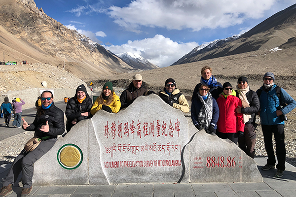 Guests Taking Pictures in Front of Moutn Everest