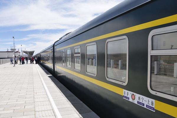 A Tibet train from Xining to Lhasa stopping at the station